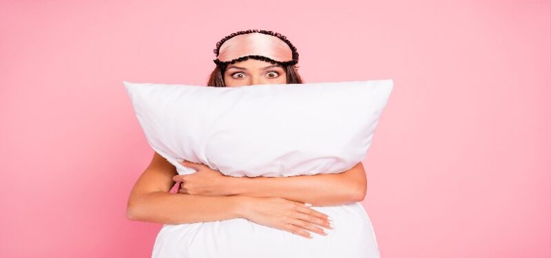 woman-holding-pillow